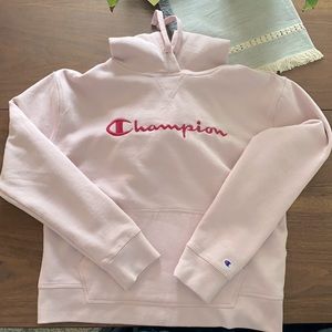 Women’s never worn champion hoodie. Light pink. Size medium